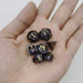 Dice - Metal - Hollow Hymgho Hollow 10mm mini Dragon's Eye dice set-Gunmetal with Purple Gems