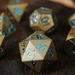 Warworn Gold 7-Piece Metal Dice Set - Saltire Games